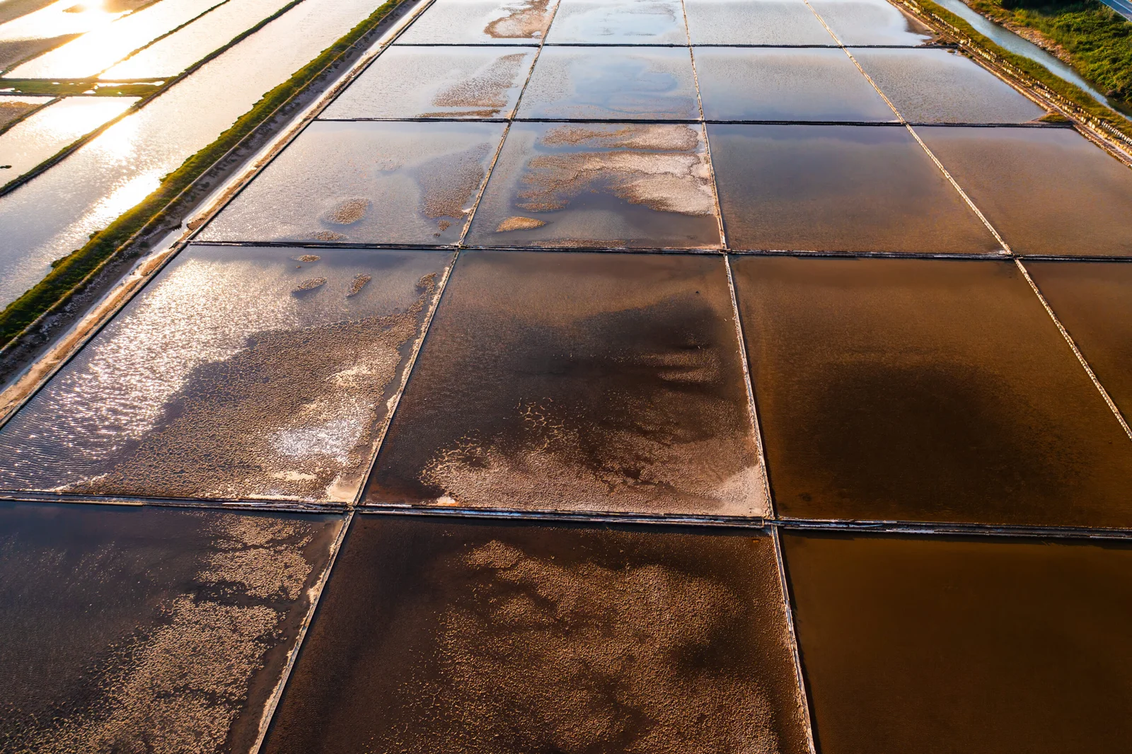 basins-with-seawater-evaporate-sun-wind-pag-island-traditional-methods-production-scaled basins-with-seawater-evaporate-sun-wind-pag-island-traditional-methods-production-scaled